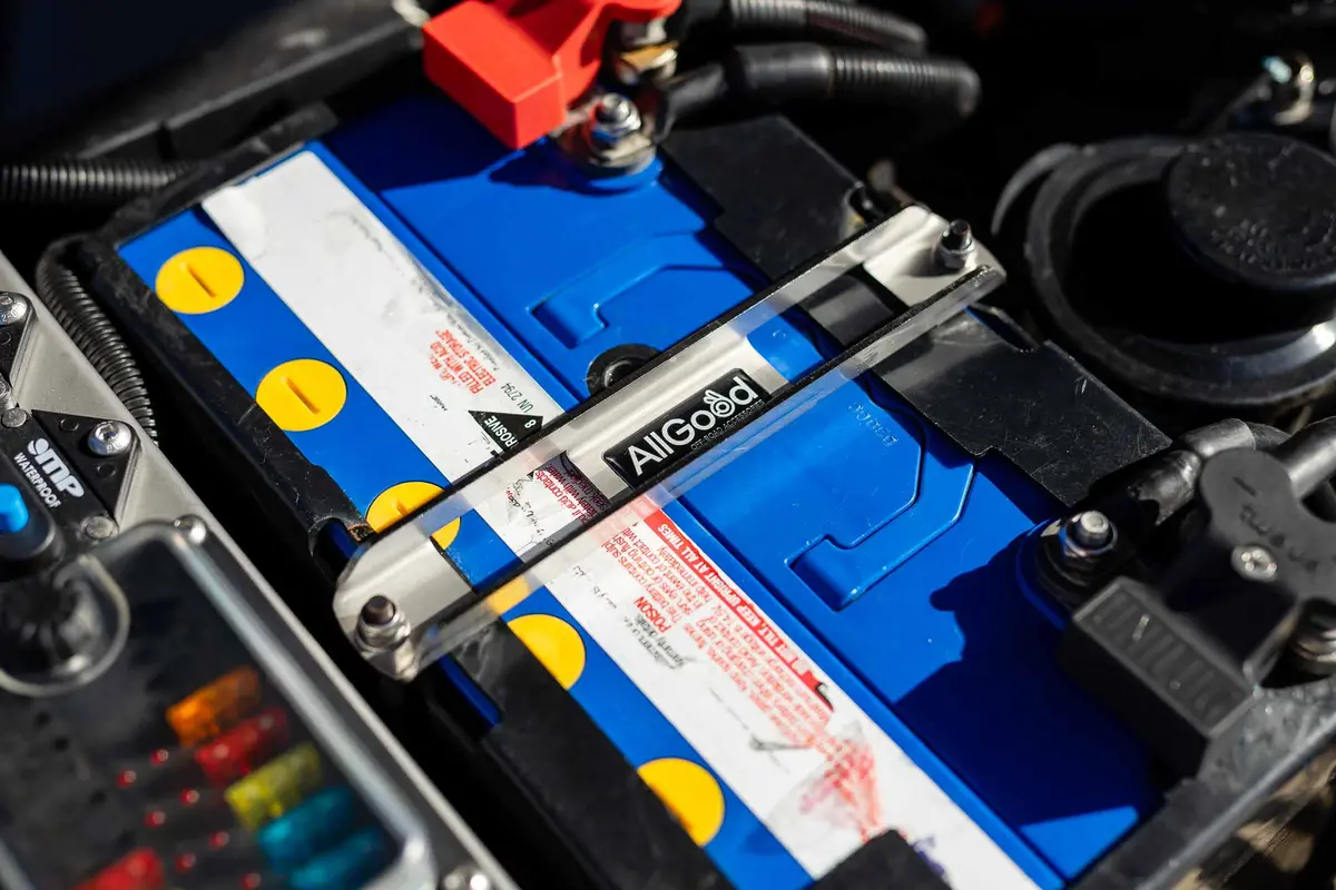 Battery Tie-Down Bracket - Port Top 1