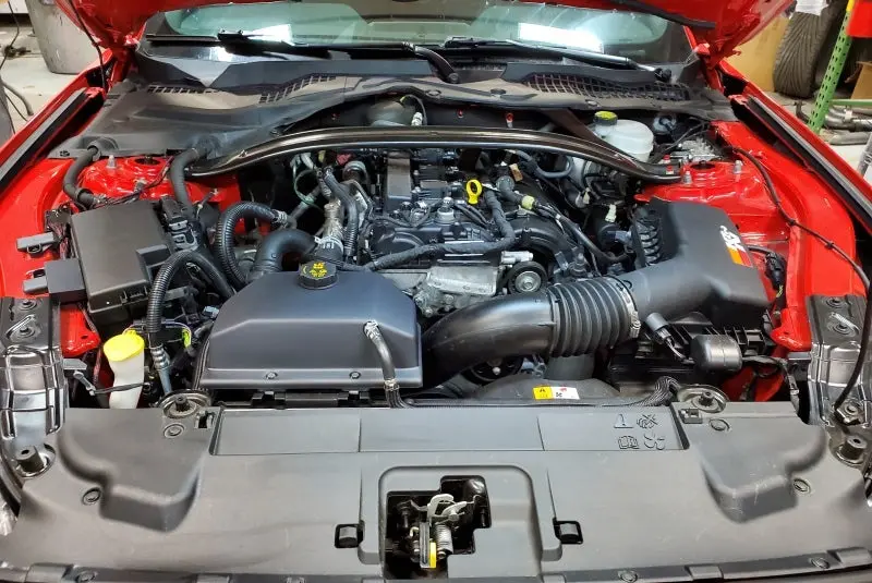 Jlt Black Textured Coolant Reservoir Cover For 2015–2019 Ford Mustang 1