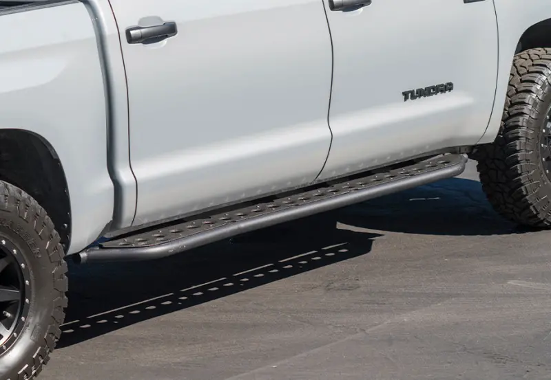 Cali Raised 14-21 Toyota Tundra Step Ed Rock Sliders - Kick Out Bedliner Filler Plate/Raw Steel 1